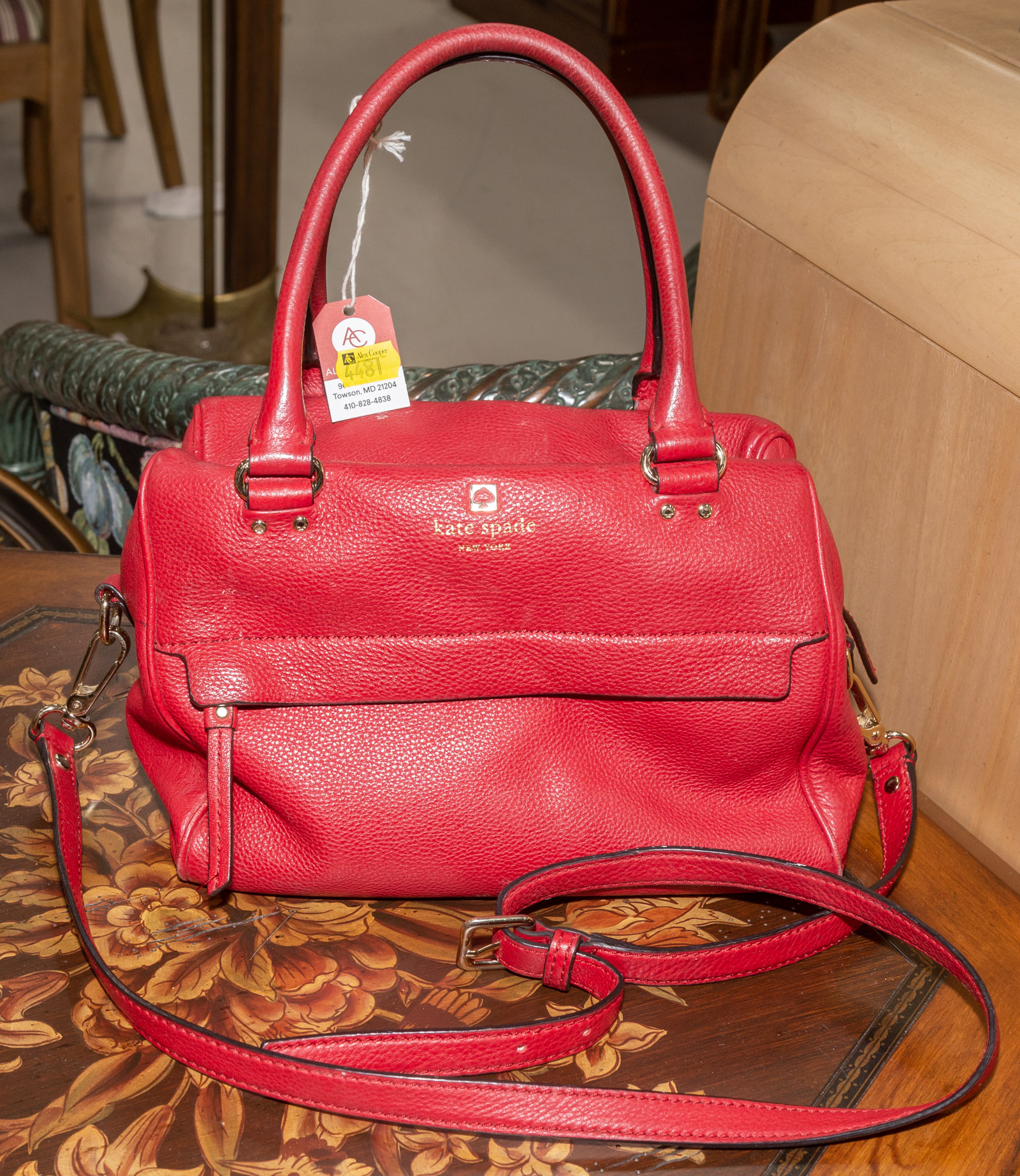 Appraisal: A RED KATE SPADE BAG A red leather Kate Spade