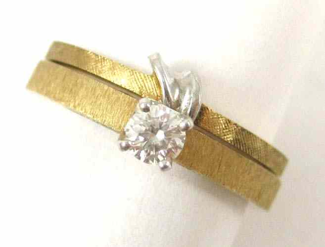 Appraisal: DIAMOND AND FOURTEEN KARAT GOLD RING AND RING GUARD the