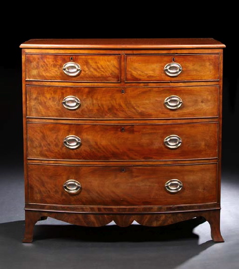 Appraisal: Regency Mahogany Bowfront Chest th century the bowed top over