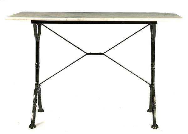 Appraisal: A marble topped wrought metal table and two side chairs