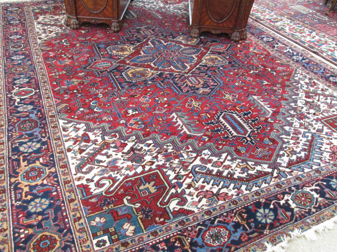 Appraisal: SEMI-ANTIQUE PERSIAN HERIZ CARPET East Azerbaijan Province northwest Iran hand