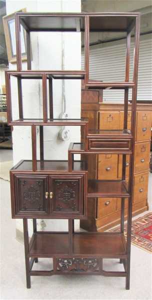 Appraisal: CHINESE ROSEWOOD ETAGERE having nine levels of open shelves a