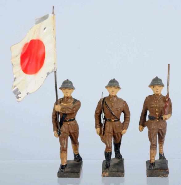 Appraisal: Lineol cm Japanese Flagman Marchers Includes a Japanese flagman and