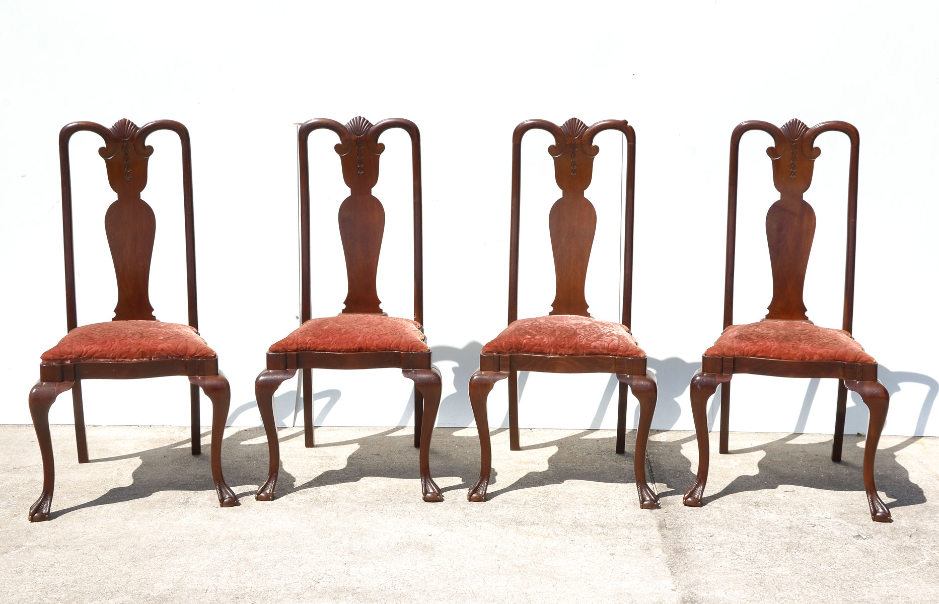 Appraisal: CHIPPENDALE CHAIRS Chippendale chairs having a carved shell draping foliate