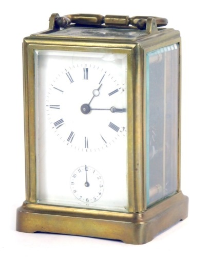 Appraisal: A thC brass carriage clock with white Roman numeric dial