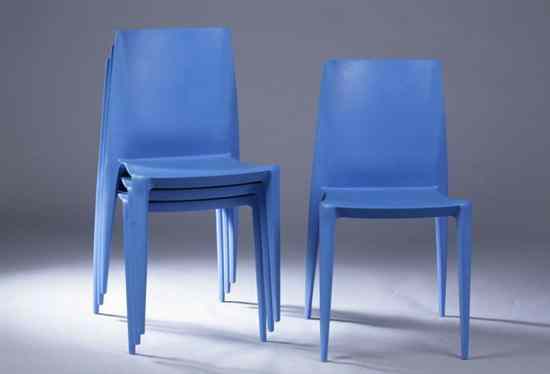 Appraisal: SET OF FOUR CONTEMPORARY BLUE SYNTHETIC-CAST STACKING CHAIRS Tapered back