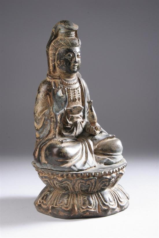 Appraisal: CHINESE BRONZE FIGURE OF GUANYIN Seated on double lotus throne