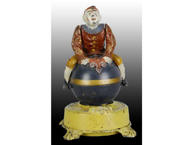 Appraisal: Cast Iron Clown on Globe Mechanical Bank Description All original