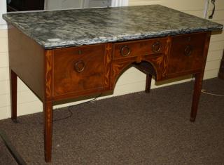 Appraisal: Southern Hepplewhite mahogany slab top server having ornate bellflower and