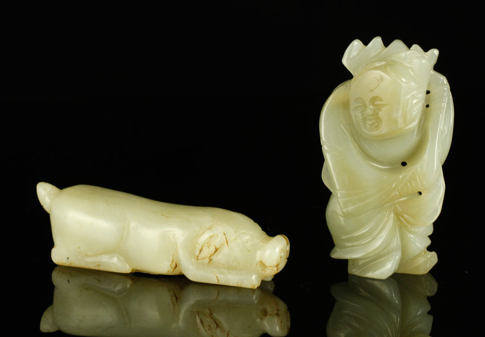 Appraisal: - Two Chinese Carved Jade Pendants Two Chinese carved jade