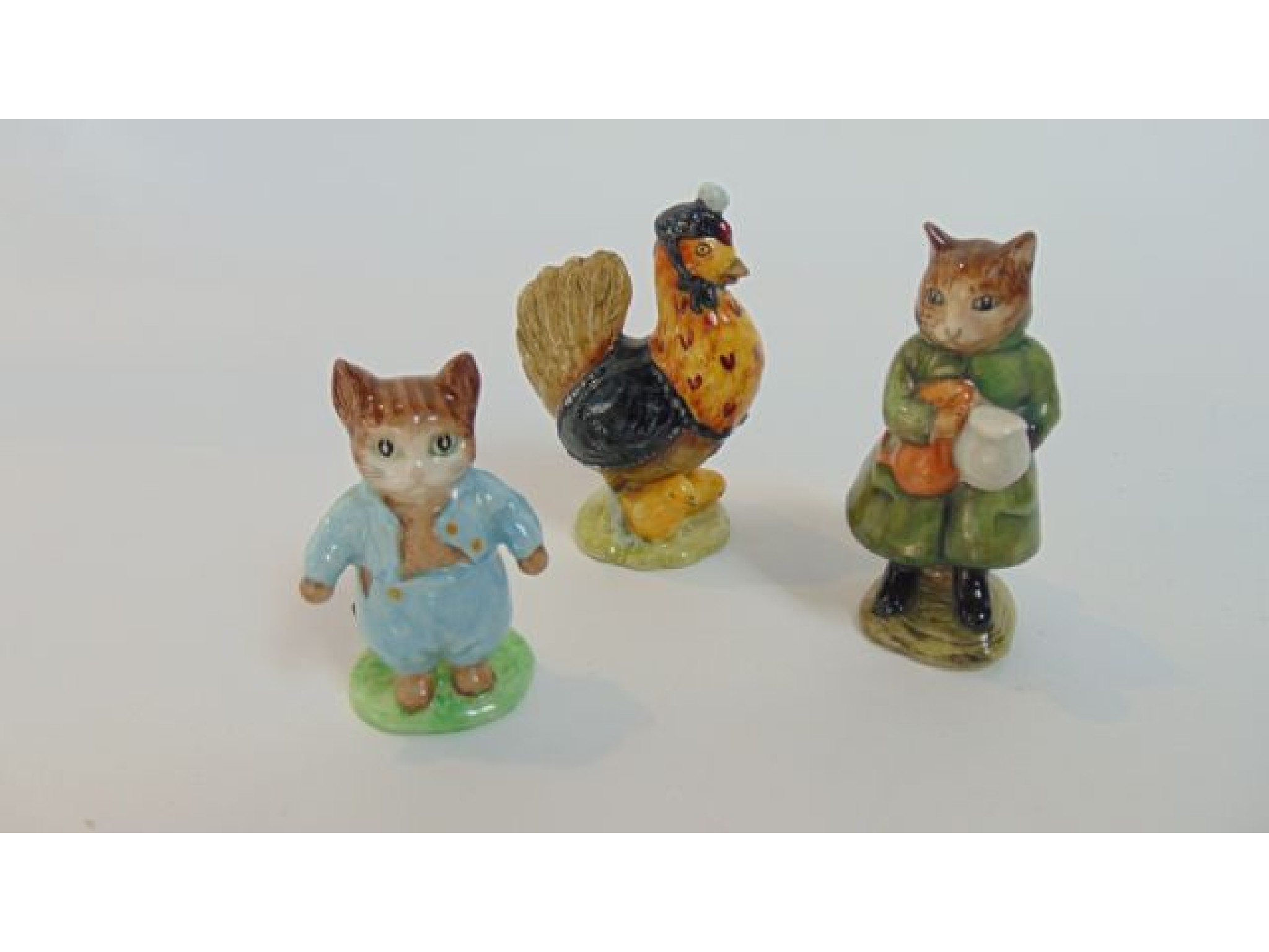 Appraisal: Three Beswick Beatrix Potter figures comprising Simpkin Tom Kitten and