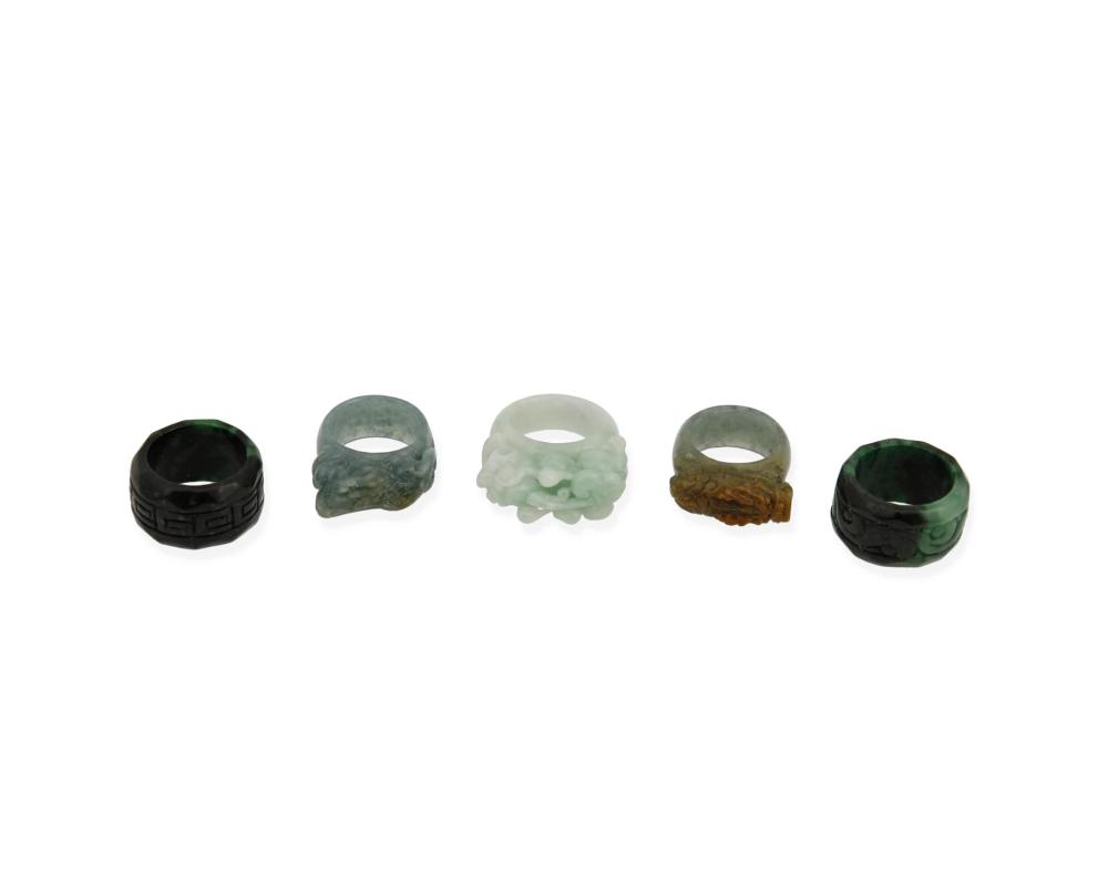 Appraisal: FIVE CARVED JADE RINGSFive carved jade rings Including five jade