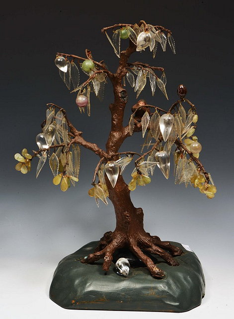 Appraisal: A CHINESE MODEL MINIATURE TREE with monkey and having glass