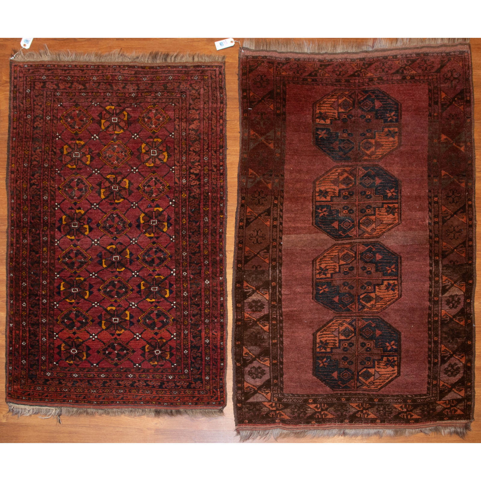 Appraisal: PAIR OF BALOUCH AND BOKHARA RUGS PERSIA X Third quarter-