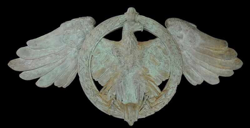 Appraisal: CAST-LEAD MASSIVE ARCHITECTURAL RONDEL Modeled as an eagle clutching crossed