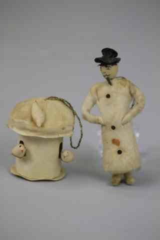 Appraisal: CIGAR SMOKING SNOWMAN ORNAMENT AND BIRD FEEDER Germany spun cotton