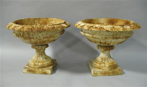 Appraisal: PAIR OF CAST IRON GARDEN URNS After the antique of