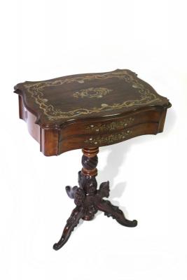 Appraisal: A th Century rosewood and brass inlaid work table fitted