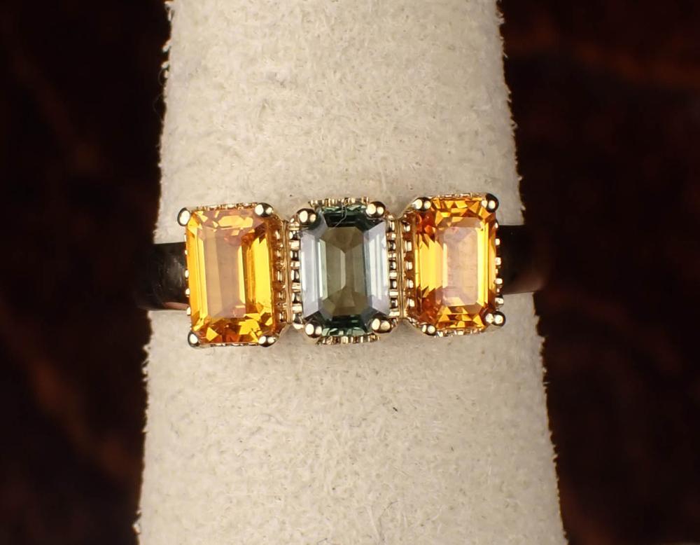 Appraisal: MULTI COLOR SAPPHIRE AND YELLOW GOLD RING The k gold