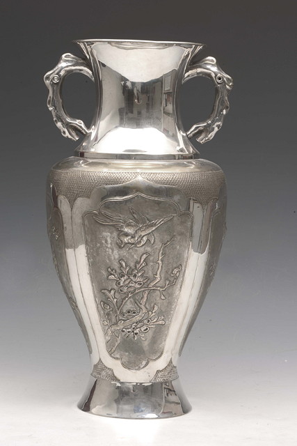 Appraisal: A LARGE CHINESE SILVER PLATED BALUSTER VASE with naturalistic handles