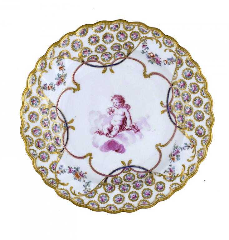 Appraisal: A CHELSEA-DERBY PLATE possibly by James Banford painted en puce