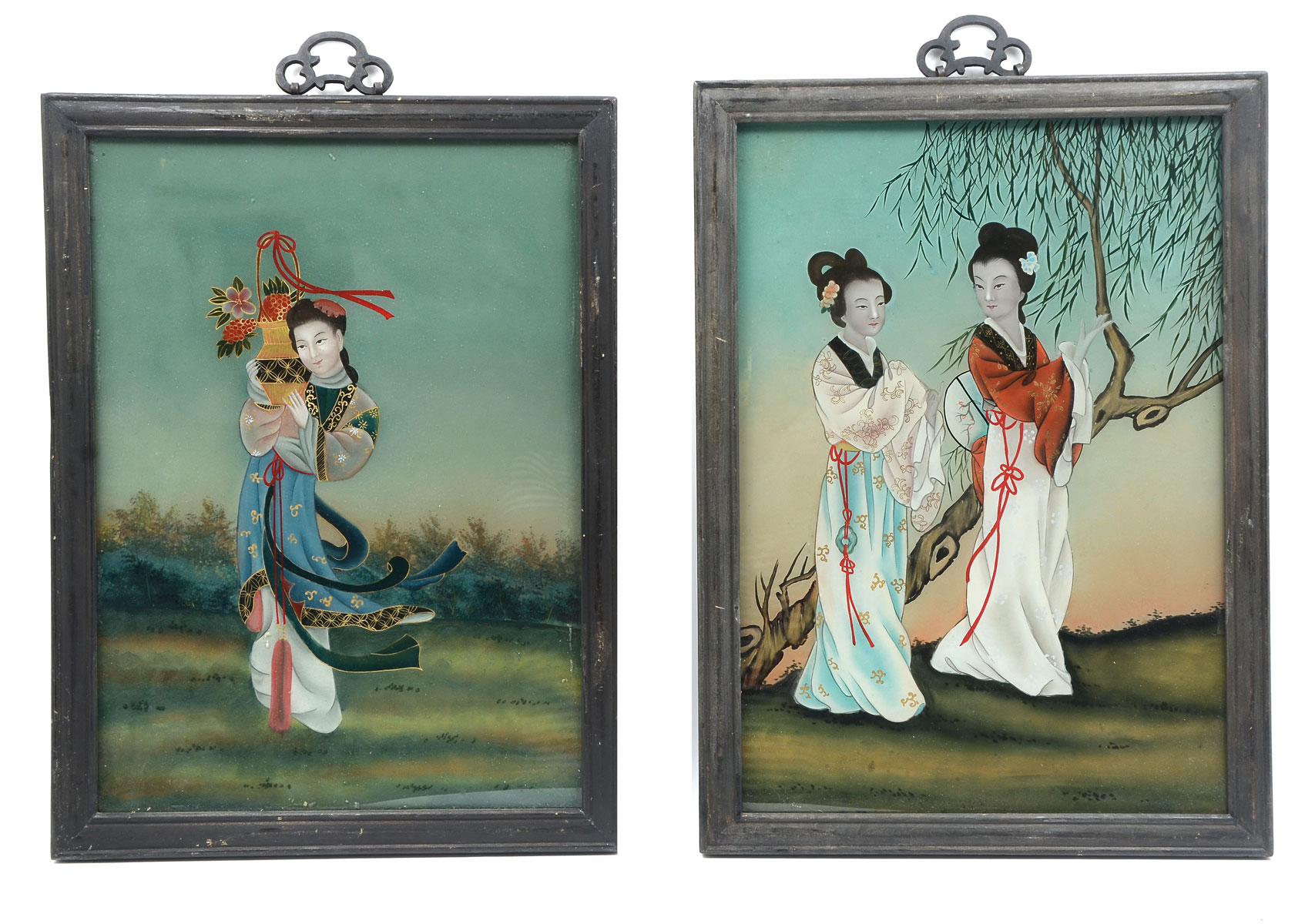 Appraisal: TWO ORIENTAL REVERSE PAINTINGS ON GLASS First Scene Young Woman