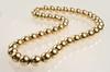 Appraisal: NECKLACE - One strand of forty-three mm hollow K gold