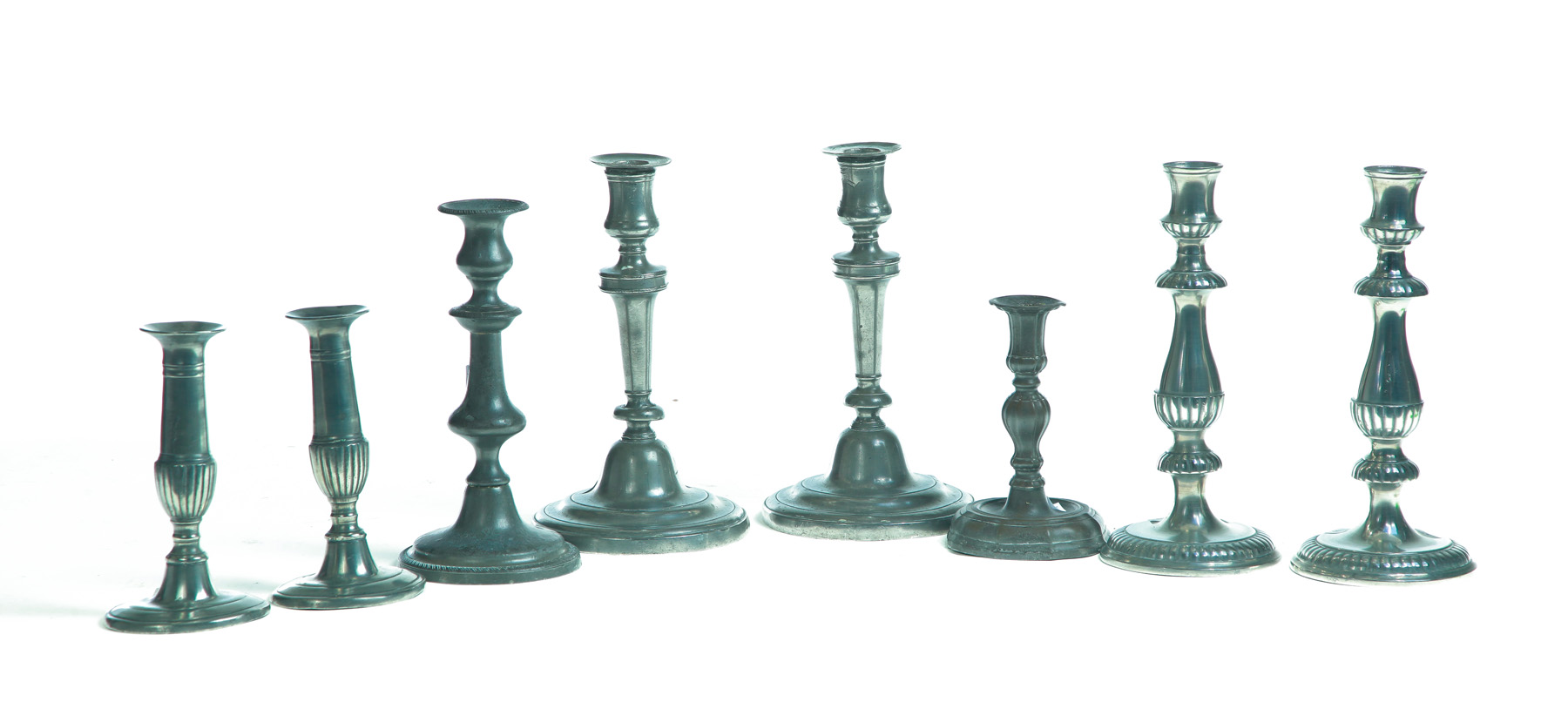 Appraisal: EIGHT PEWTER CANDLESTICKS American and European th century Three polished