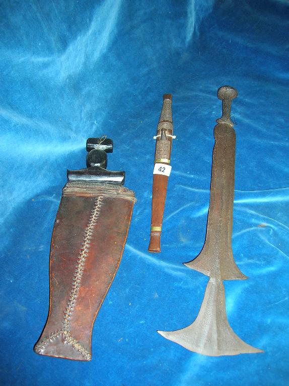 Appraisal: Three African Tribal knives two in original wood and leather