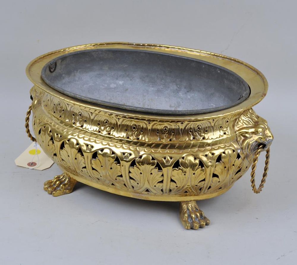 Appraisal: Continental Oval Brass Planter with pierced foliate decoration on paw