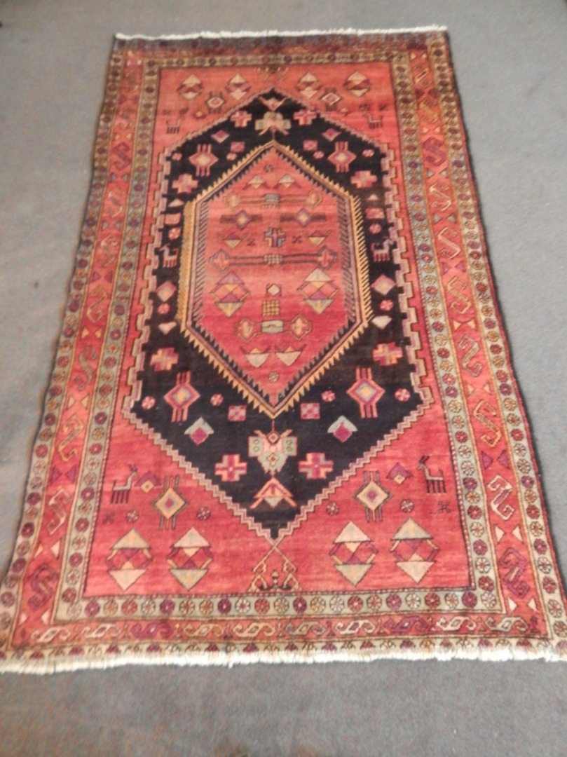 Appraisal: A Persian Hamadan rug central pole medallion on a navy