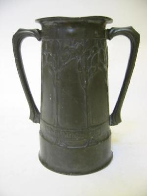 Appraisal: A TUDRIC PEWTER TWO HANDLED VASE of tapering cylindrical form