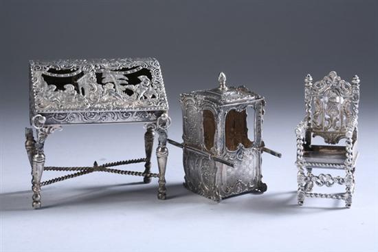 Appraisal: THREE SILVER MINIATURES Venetian sedan chair Dutch slant-front desk the