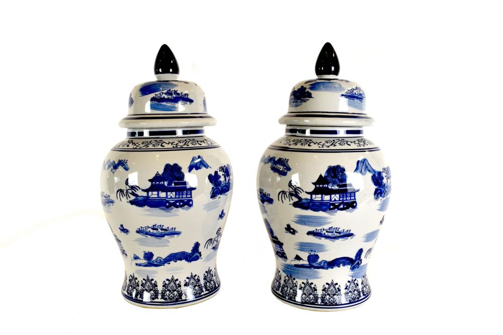 Appraisal: TWO CHINESE STYLE BLUE WHITE EARTHENWARE COVERED JARSModern the underside