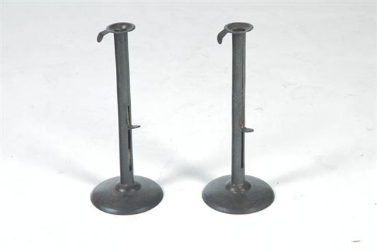 Appraisal: PAIR OF HOGSCRAPER CANDLESTICKS American mid th century Unusual tall