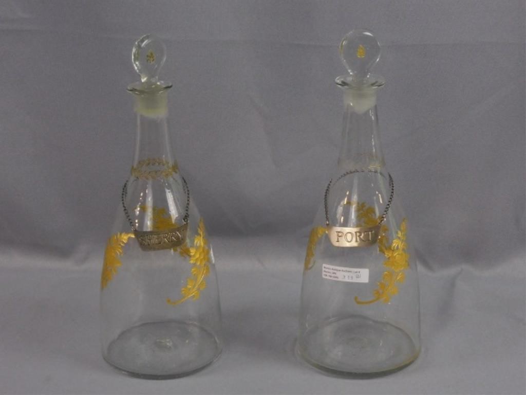 Appraisal: PAIR OF BLOWN GLASS DECANTERS EARLY TH C CUTfloral accents