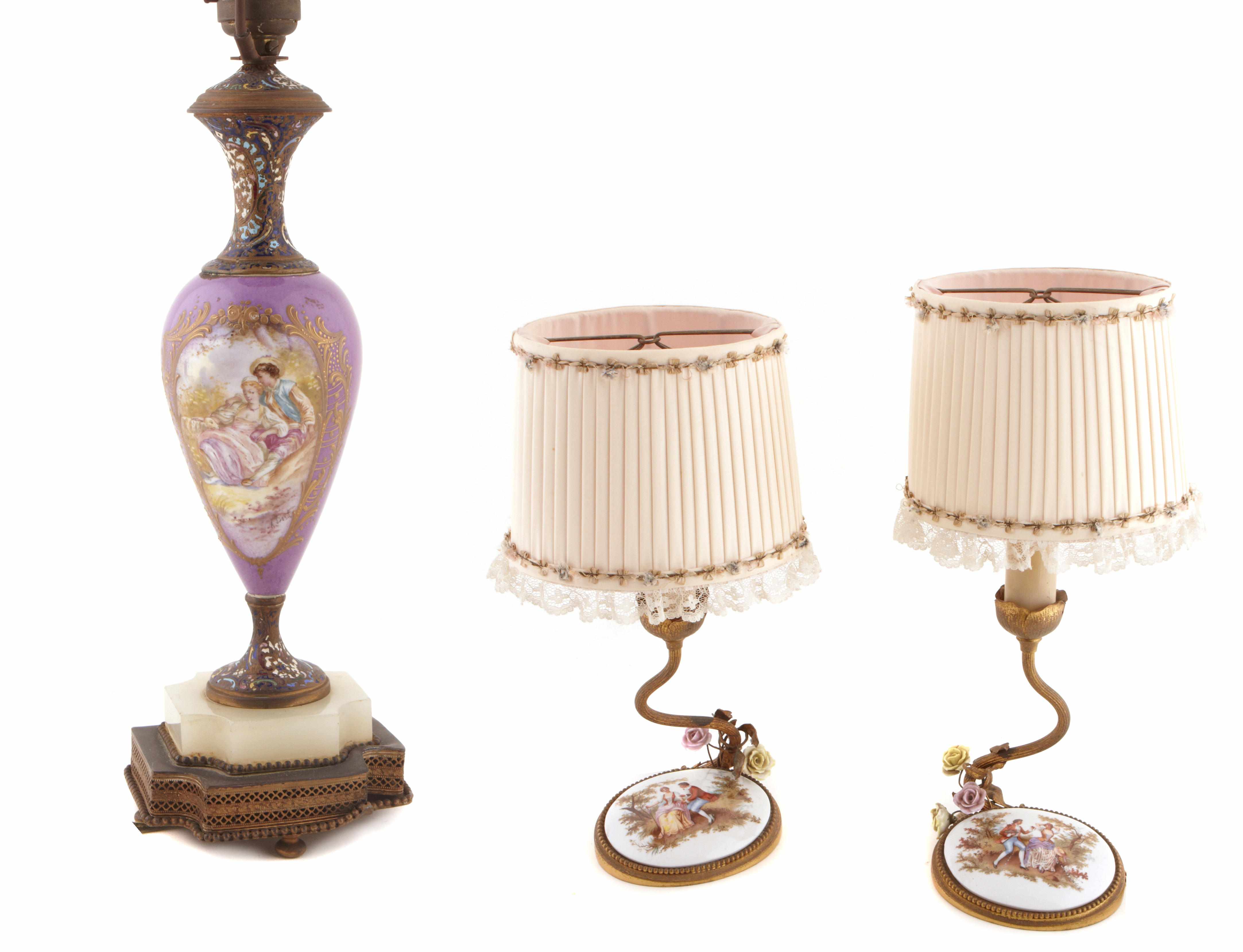 Appraisal: A group of three French gilt metal and porcelain table