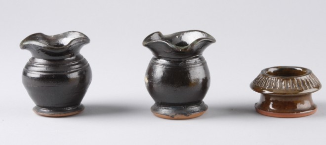 Appraisal: Lot of three Two small matching vases with dark brown