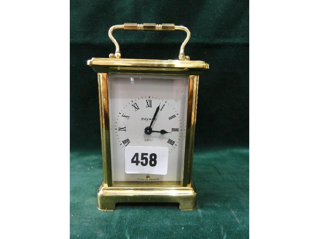 Appraisal: A French brass carriage clock with loop handle and enamel