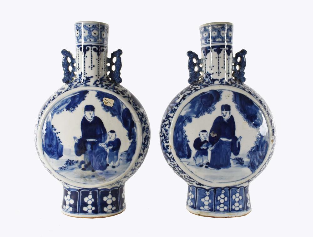 Appraisal: PAIR OF CHINESE BLUE WHITE PORCELAIN MOON FLASK VASESBearing a