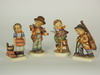 Appraisal: HUMMEL FIGURINES - Lot of four M I Hummel figurines