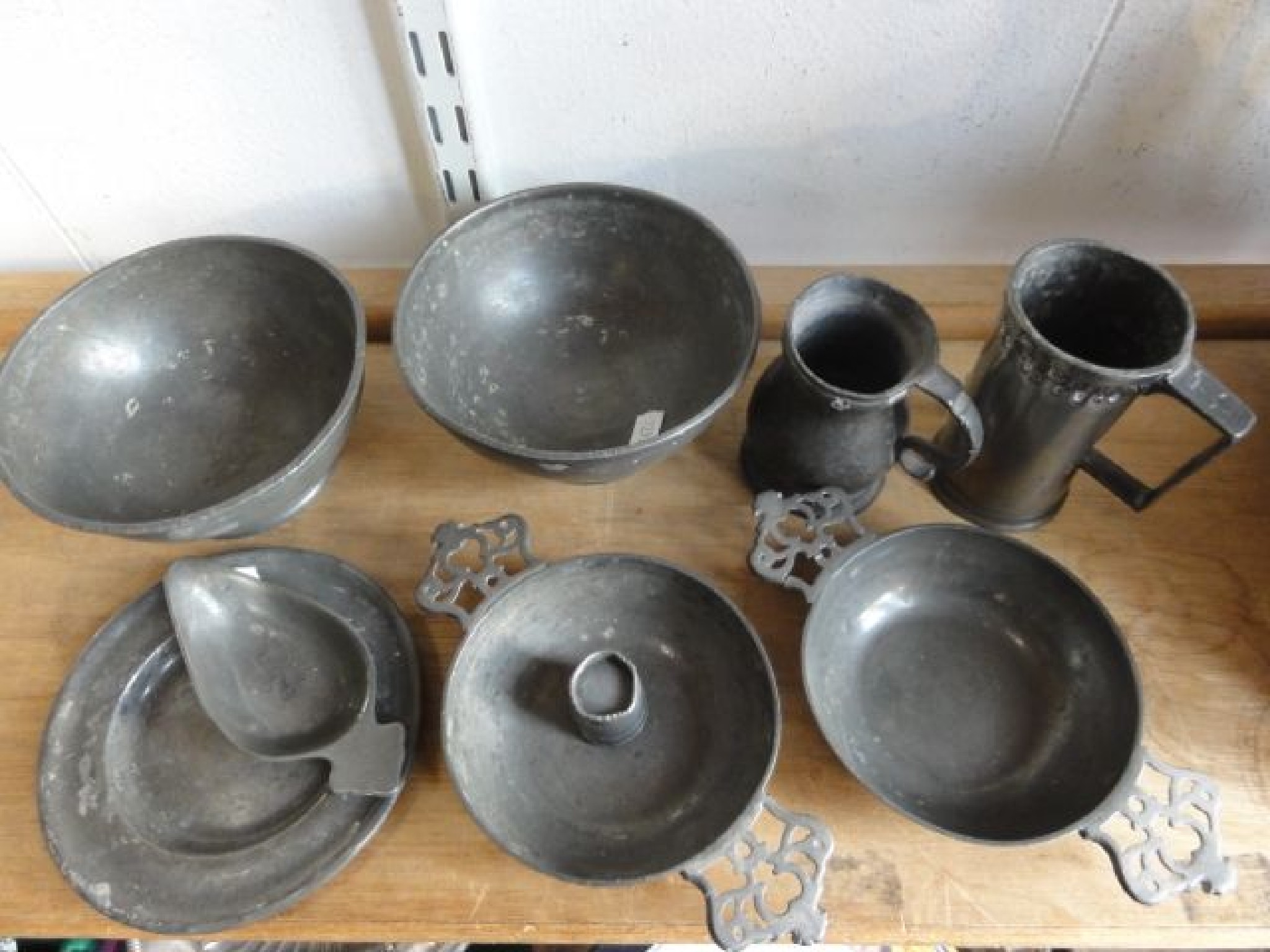 Appraisal: A selection of antique pewter wares to include a small