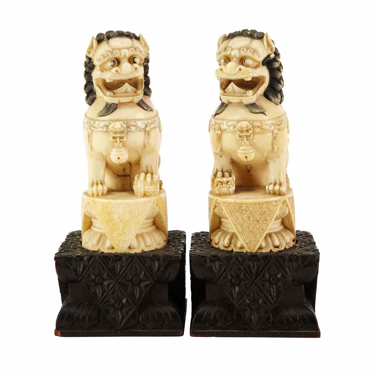 Appraisal: Pair of Ivory Carved Fu-Lions th Century Each seated on