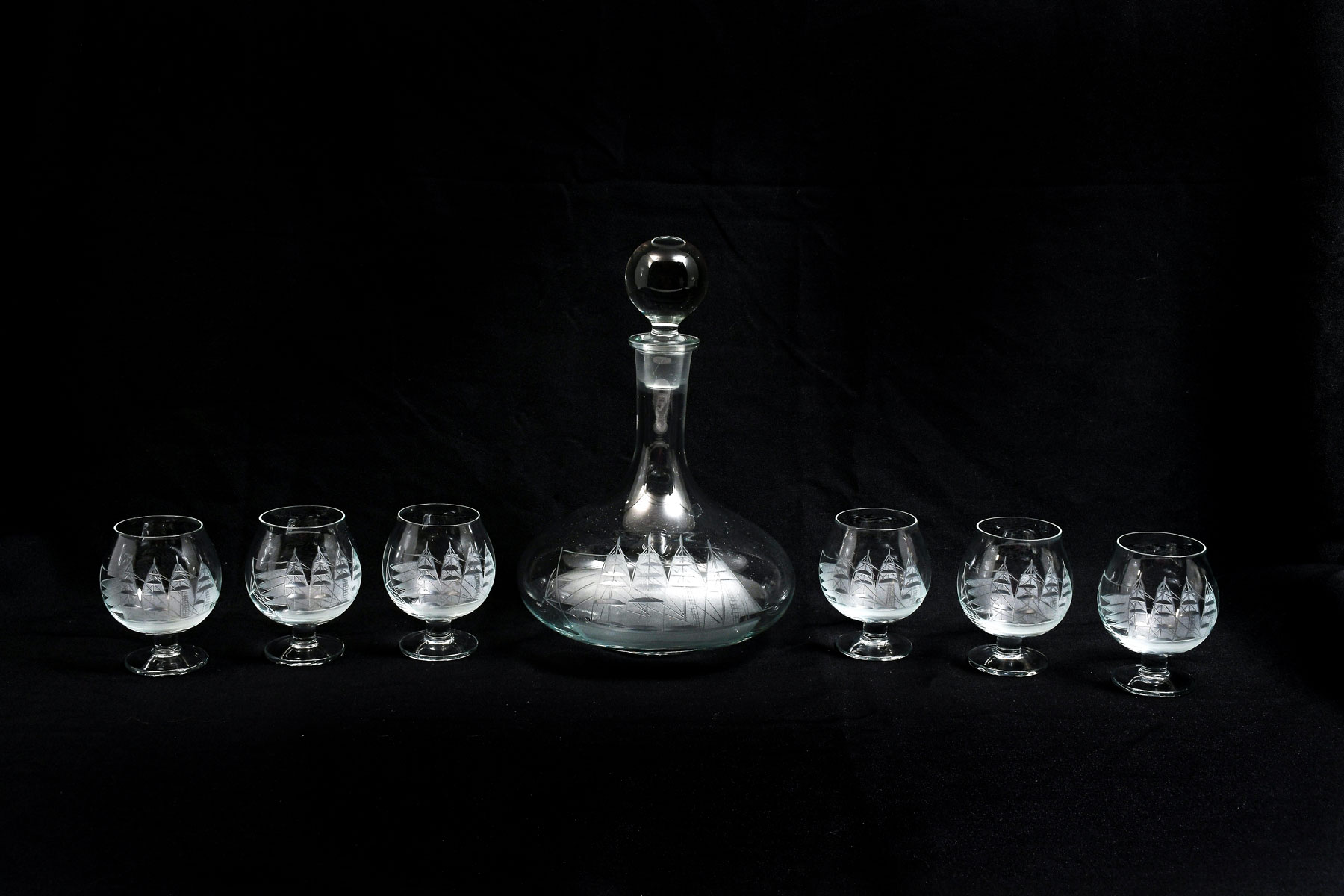 Appraisal: ORREFORS SHIP ENGRAVED DECANTER SIX GLASSES Comprising - Decanter -