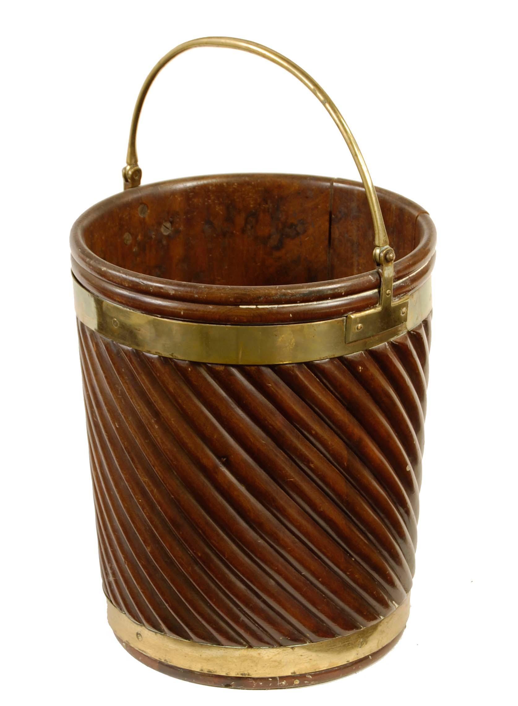 Appraisal: A George IV mahogany and brass bound peat bucket