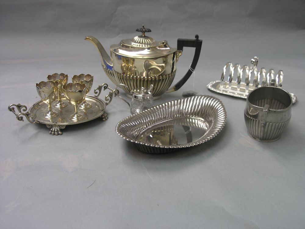 Appraisal: A silver plated teapot oval half reeded form together with