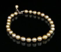 Appraisal: Magnificent Strand of Golden Tone South Sea Baroque Pearls by