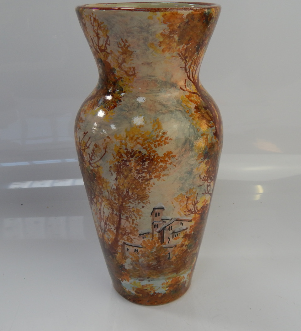 Appraisal: A Studio Pottery vase with indistinct signature and woodland scene