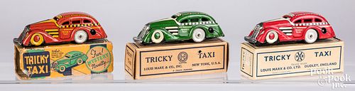 Appraisal: THREE MARX TRICKY TAXI WIND-UP CARSThree Marx Tricky Taxi wind-up