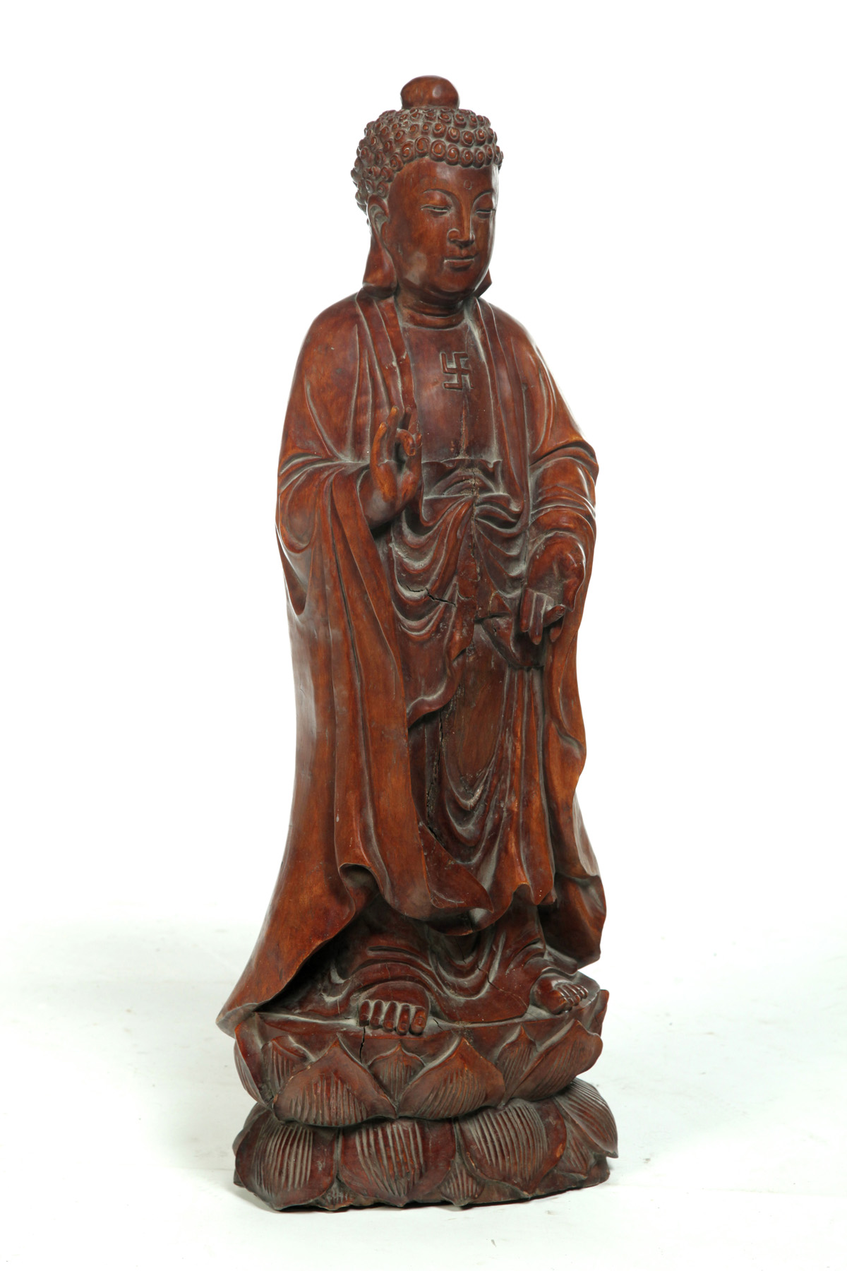 Appraisal: ASIAN BUDDHA CARVING Twentieth century hardwood Standing robed figure of